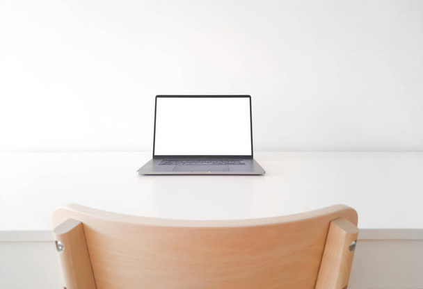 laptop on white table front view - Fotografie, Obrázek