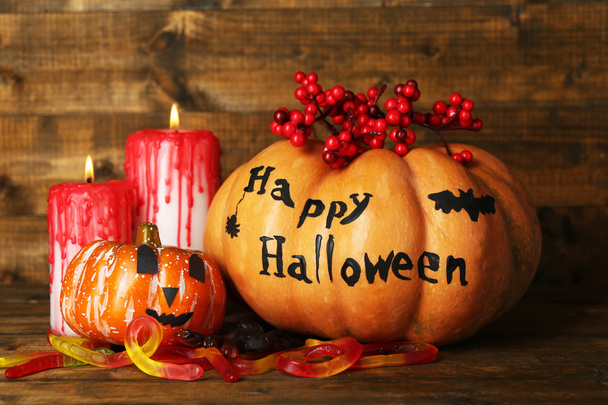 Halloween pumpkins and candies - Фото, зображення