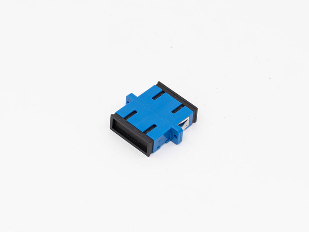 SC-UPC adapter for single mode fiber optic patch cord with flange on isolated white background - Fotó, kép