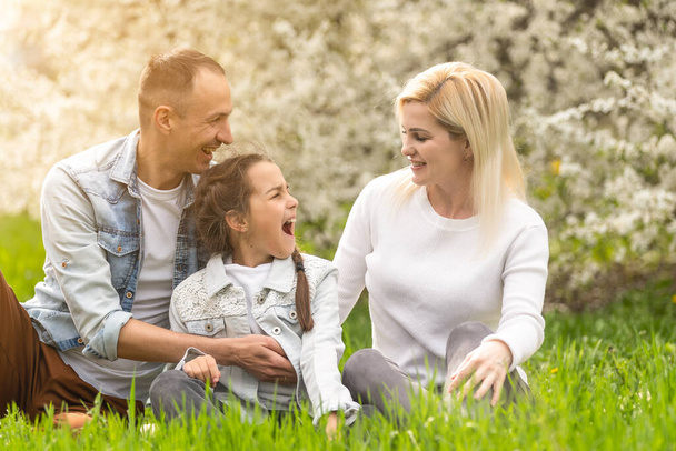 happy young family spending time outdoor - Photo, Image