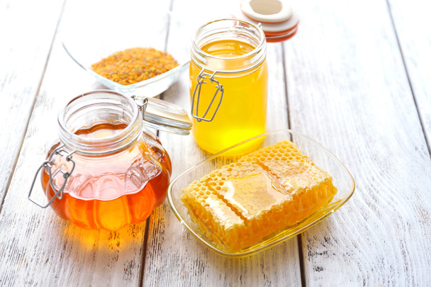 Fresh honey on wooden table - Zdjęcie, obraz