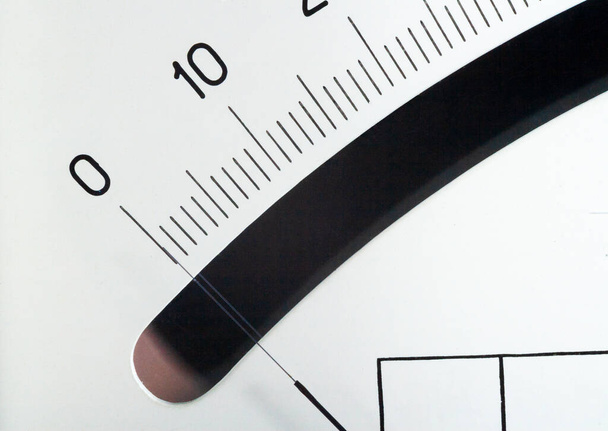 scale with an arrow on a white background. Device for measuring the strength of electric current. - Photo, Image