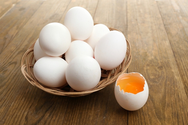 Eggs on wooden table close-up - Fotografie, Obrázek