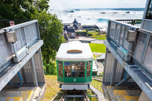 Niagara Falls, Canada - August 27, 2021: Niagara Parks Falls Incline Railway connect Fallsview Area with Table Rock Centre, provides riders a unique vantage point of the Horseshoe Falls. - Photo, Image