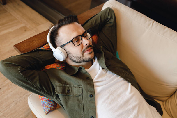handsome man with headphones chill at home - Foto, imagen