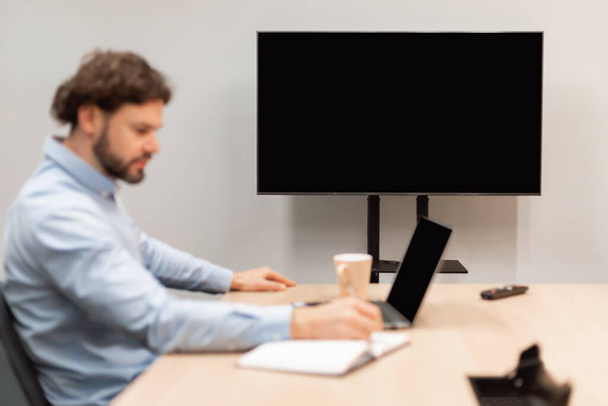 Worker Watching Webinar, Focus On Monitor With Black Empty Screen, - Фото, зображення