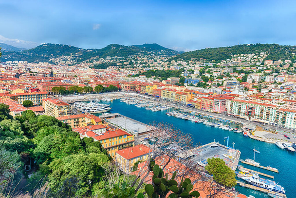 Scenic aerial view of the Port of Nice, aka Port Lympia, as seen from the Chateau hill, Nice, Cote d 'Azur, France - Фото, изображение