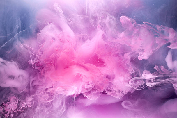 Lilac smoke on black ink background, colorful pink fog, abstract swirling touch ocean sea, azure acrylic pigment paint underwater - Фото, зображення