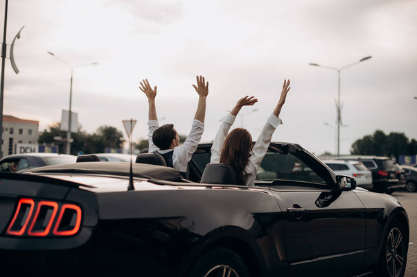 couple in love in convertible - Photo, Image