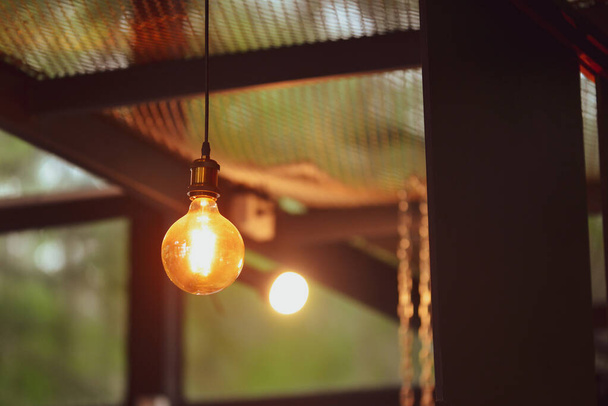 Decorative lamps in the cafe give a warm feeling. coffee shop decoration ideas - Foto, Imagem