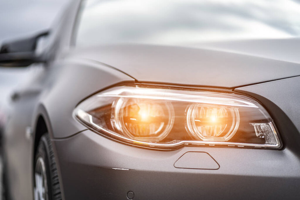 headlight front modern prestigious car closeup - Фото, изображение
