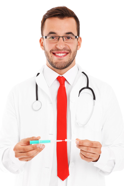 Doctor holding syringe - Valokuva, kuva
