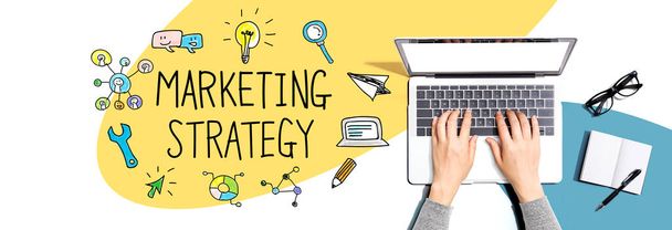 Marketing strategy with person using a laptop - Фото, изображение