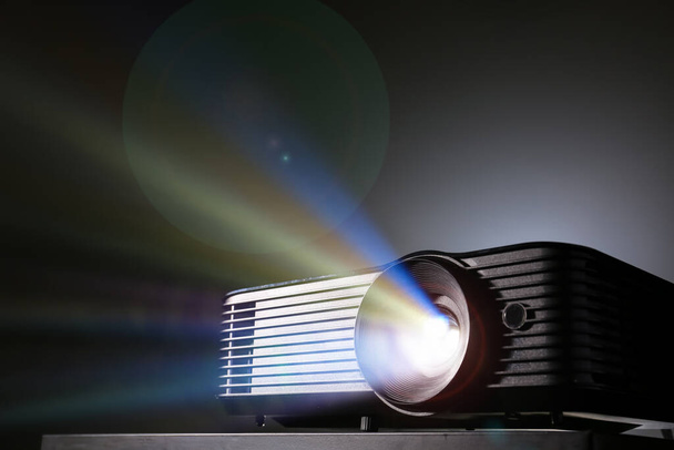 Modern video projector on black background - Photo, Image