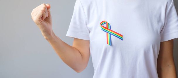 LGBTQ Rainbow ribbon for Support Lesbian, Gay, Bisexual, Transgender and Queer community and Pride month concept - Fotografie, Obrázek