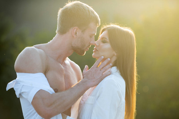 Sensual portrait of young couple in love. Loving couple embracing and kissing. - Foto, Bild