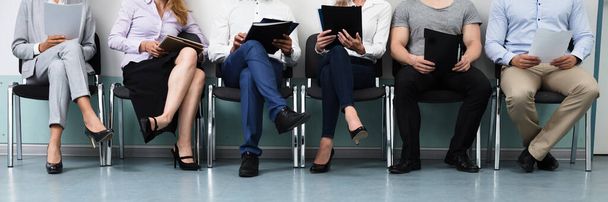Row Of Candidates Sitting On Chair For Job Interview - Photo, Image