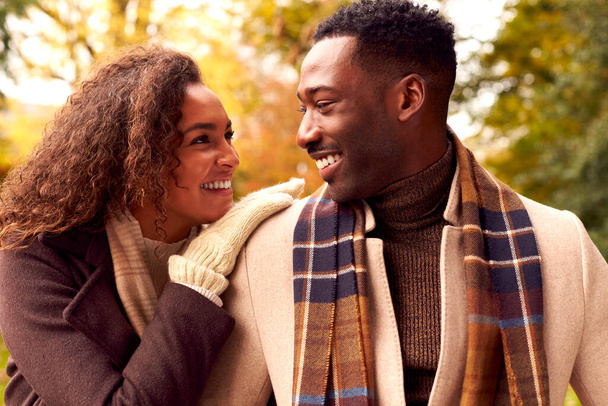 Portrait Of Loving Couple On Walk Through Autumn Countryside Together - Φωτογραφία, εικόνα