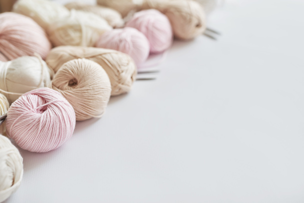 Skeins of yarn, knitting needles, accessories for knitting. Handmade, hobby. - Zdjęcie, obraz
