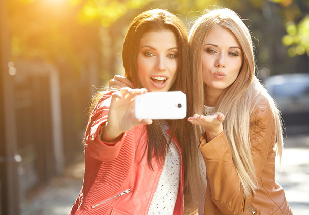 Beautiful young women making selfie - Fotoğraf, Görsel