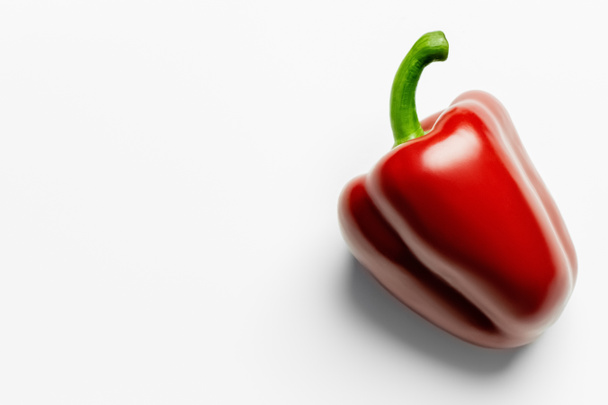 Top view of ripe paprika on white background  - Foto, Imagen