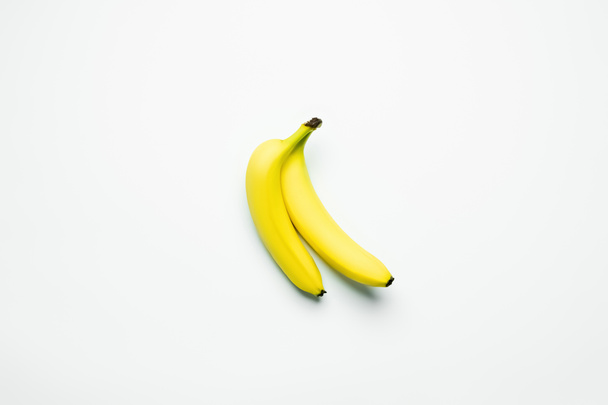Top view of fresh bananas on white background  - Photo, Image