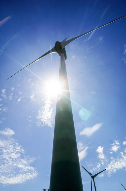 wind turbine on background of blue sky, beautiful photo digital picture - Photo, Image