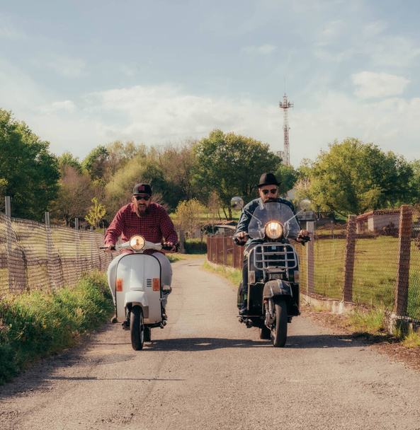two bearded men riding motorcycles - Foto, immagini