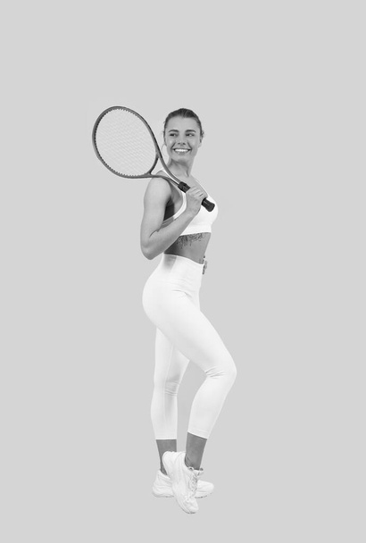 sporty woman tennis player with fit body in sportswear hold badminton racket, sport. - Photo, Image