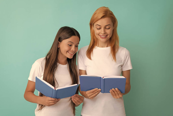 smiling school pupil and student reding books, back to school - Fotografie, Obrázek