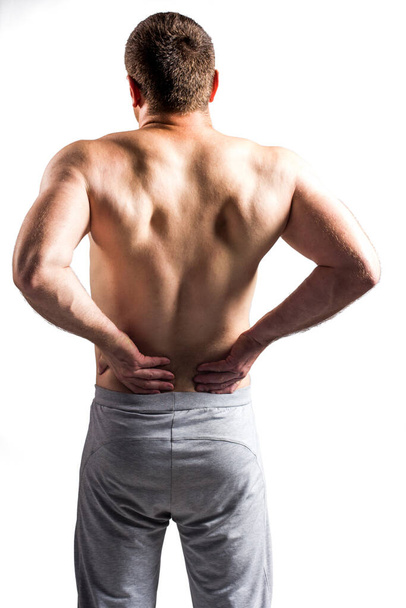 Боль в теле мужчины на сером фоне
 - Фото, изображение