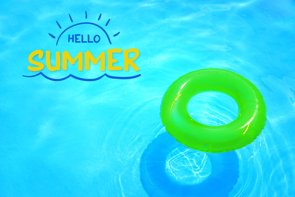 Inflatable ring in swimming pool. Hello, summer - Photo, image