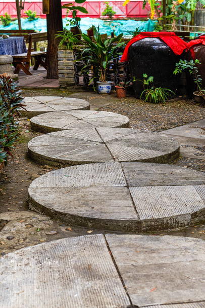Close-up of circular walkway in a Chinese garden - Φωτογραφία, εικόνα