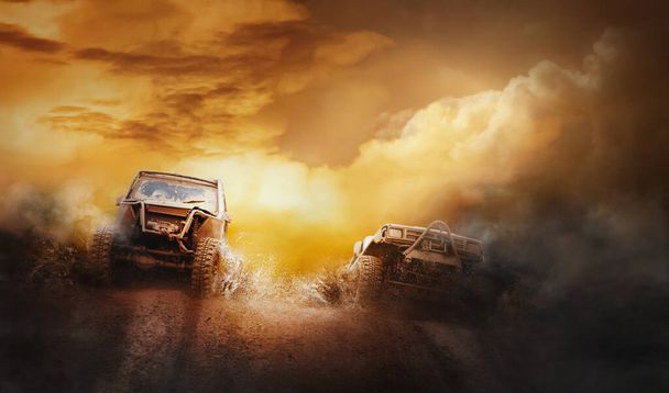 Two off road vehicles coming out of a mud hole hazard in off-road  competition. - Photo, Image