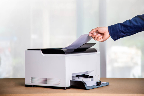 Printer, copier, scanner in office. Workplace ,photocopier machine for scanning document printing a sheet paper and xerox photocopy. - Foto, Imagem