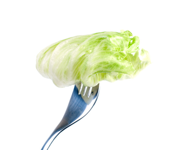 Fresh salad on a fork - Fotó, kép