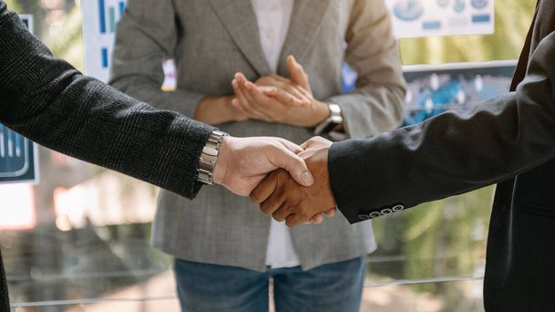 Business partnership meeting concept. Image businessmans handshake. Successful businessmen handshaking after good deal - Foto, Imagem