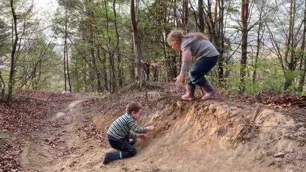Carefree children fooling around outdoors - Video, Çekim