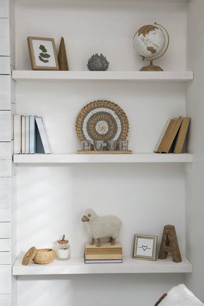 Many shelves with different decor in room. Interior design - Fotoğraf, Görsel