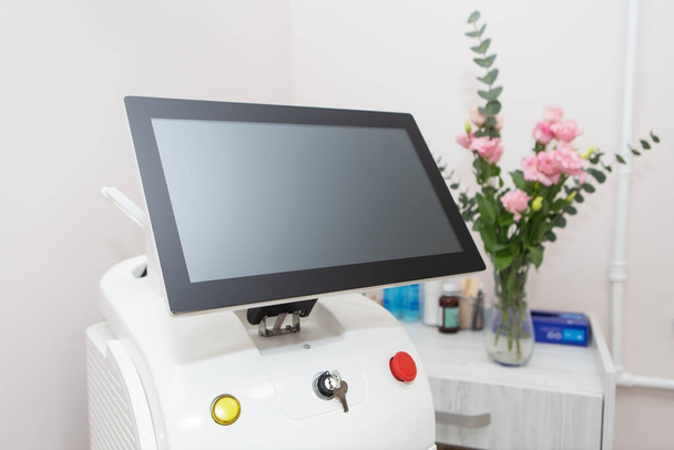 Professional laser hair removal machine, screen for setting up the hair removal process. Professional cosmetology, body epilation. Body care concept - Fotografie, Obrázek