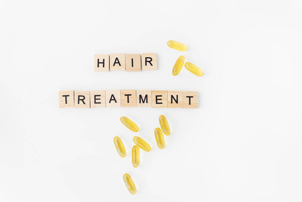 Inscription hair treatment, syringe for hair vitamin injection. The concept of hair treatment, regeneration and volumizing for hair - Fotó, kép