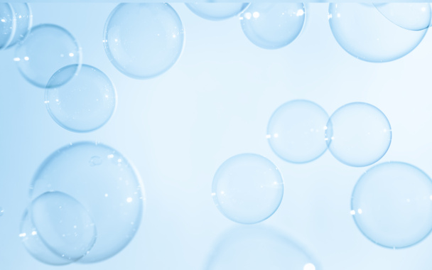 Transparent Blue Soap Bubbles Background. Soap Suds Bubbles Water - Foto, imagen