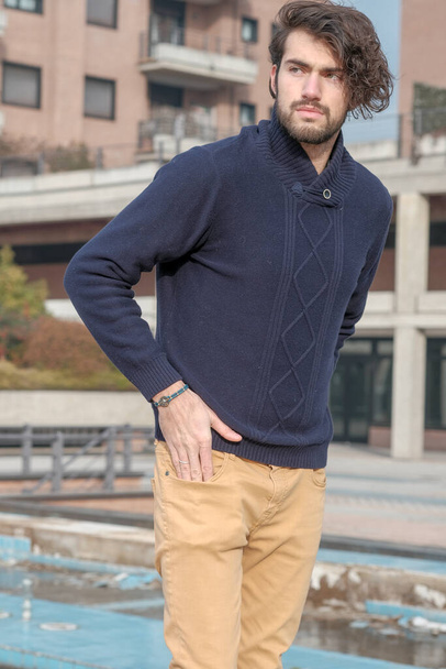 handsome guy with blue sweater. High quality photo - 写真・画像