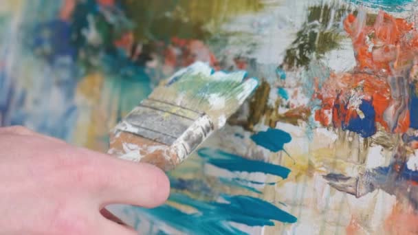 Super slow motion 240 fps, the artist paints an abstract picture in the studio. - Filmati, video