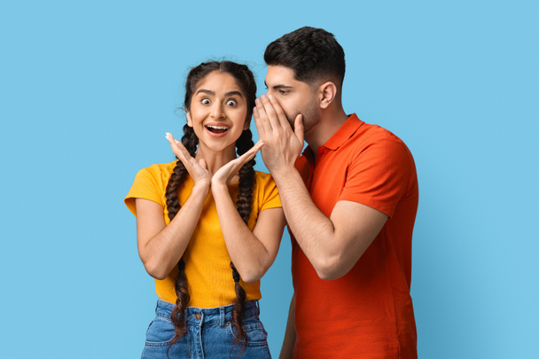 Young Arab Guy Sharing Secrets With His Excited Girlfriend, Whispering To Ear - Photo, Image