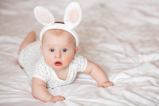 Cute little baby indoors. Baby closeup portrait on neutral background - Foto, Imagen