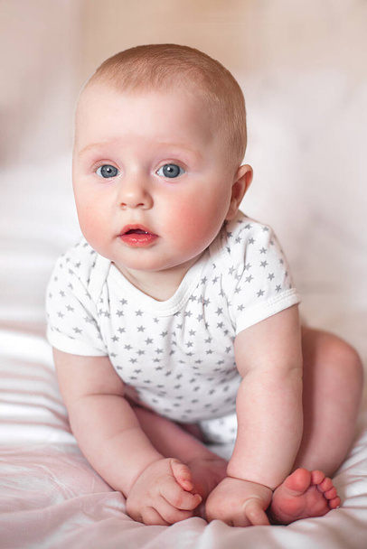 Cute little baby indoors. Lovely infant closeup portrait - Zdjęcie, obraz