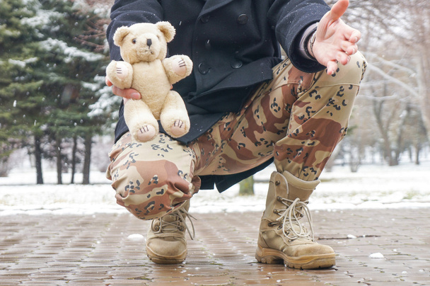 Soldier with a toy - Foto, Imagem