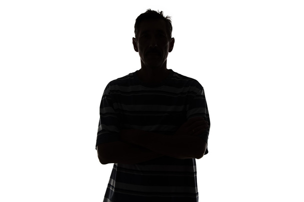 Silhouette eines erwachsenen Mannes - Foto, Bild