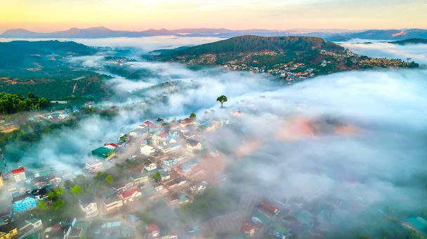Aerial view of the town mist in the sunrise sky is beautiful in the highlands of Da Lat, Vietnam - Foto, Imagen